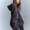 Studded Hoodie – Tops and Bodysuits